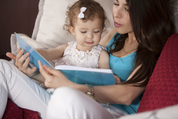 Mom reading to daughter