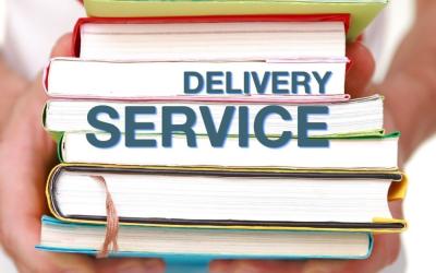 Delivery service on stack of books