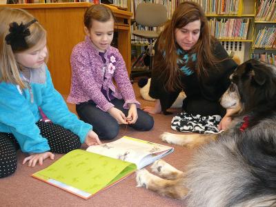 kids reading to dog