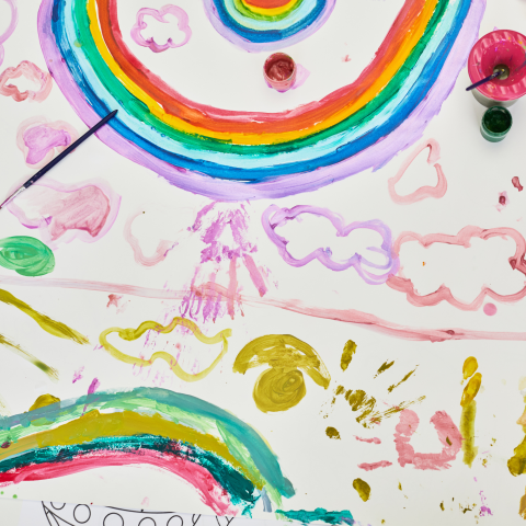 Image of colorful drawing and painting on a large sheet of paper