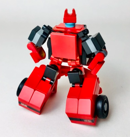 Image of a LEGO robot transformer that is red and black