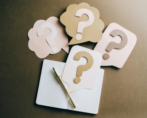 image of paper and question marks