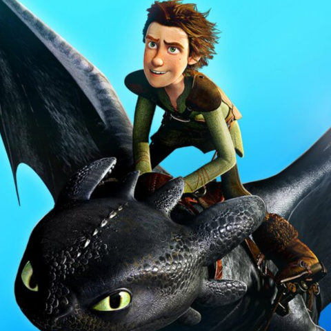 Image of an animated young man riding on the back of a dragon from the movie How to Train Your Dragon.