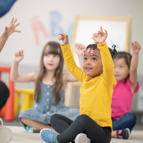 Image of a group of little ones engaging in a storytime