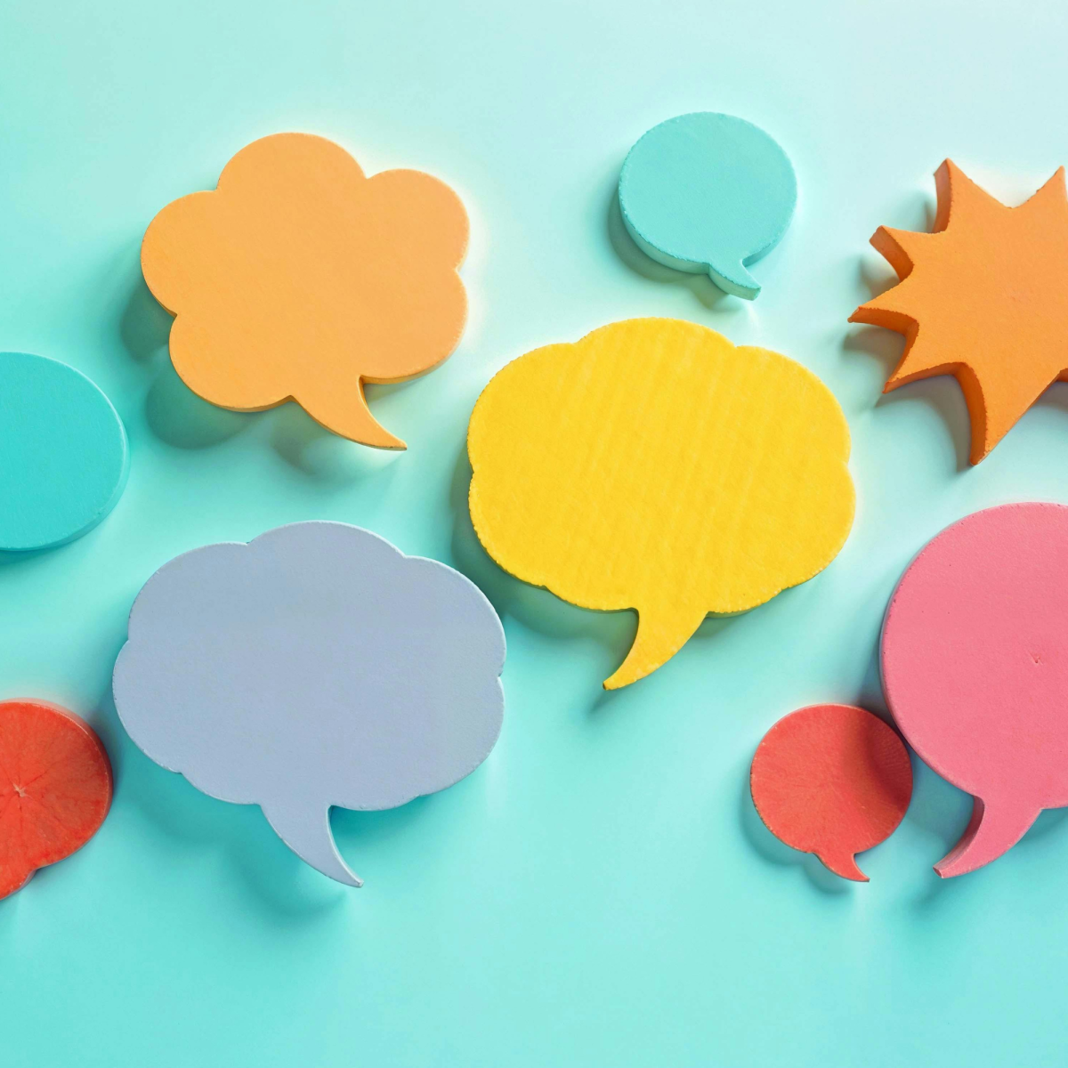 Image of conversation bubbles on a blue background