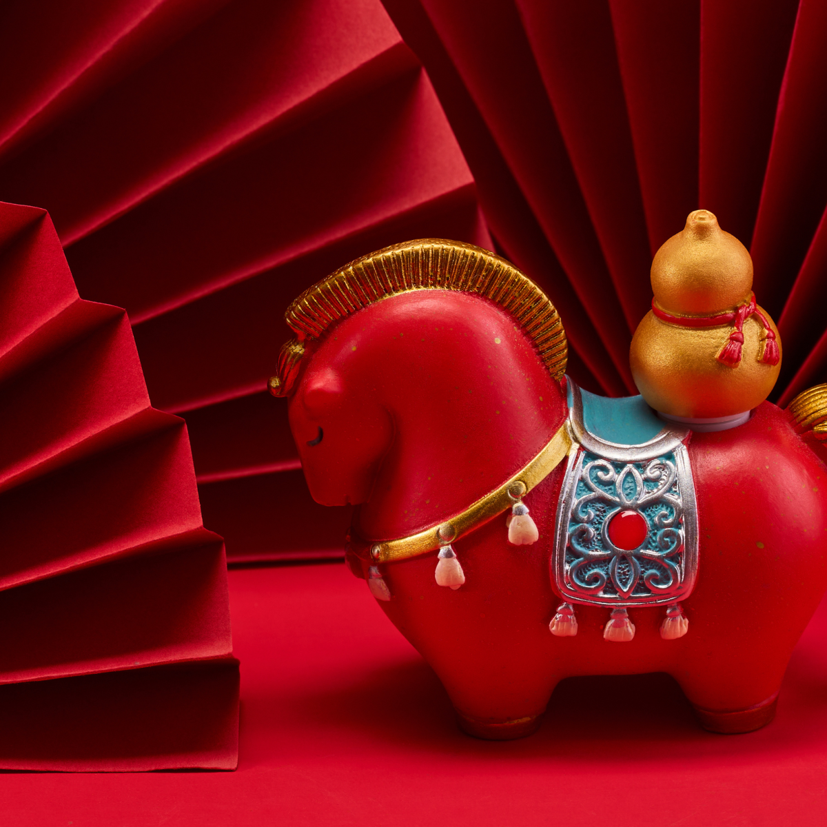 Image of a horse figurine on a red background