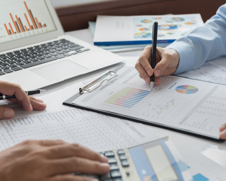 Photo of computer with papers